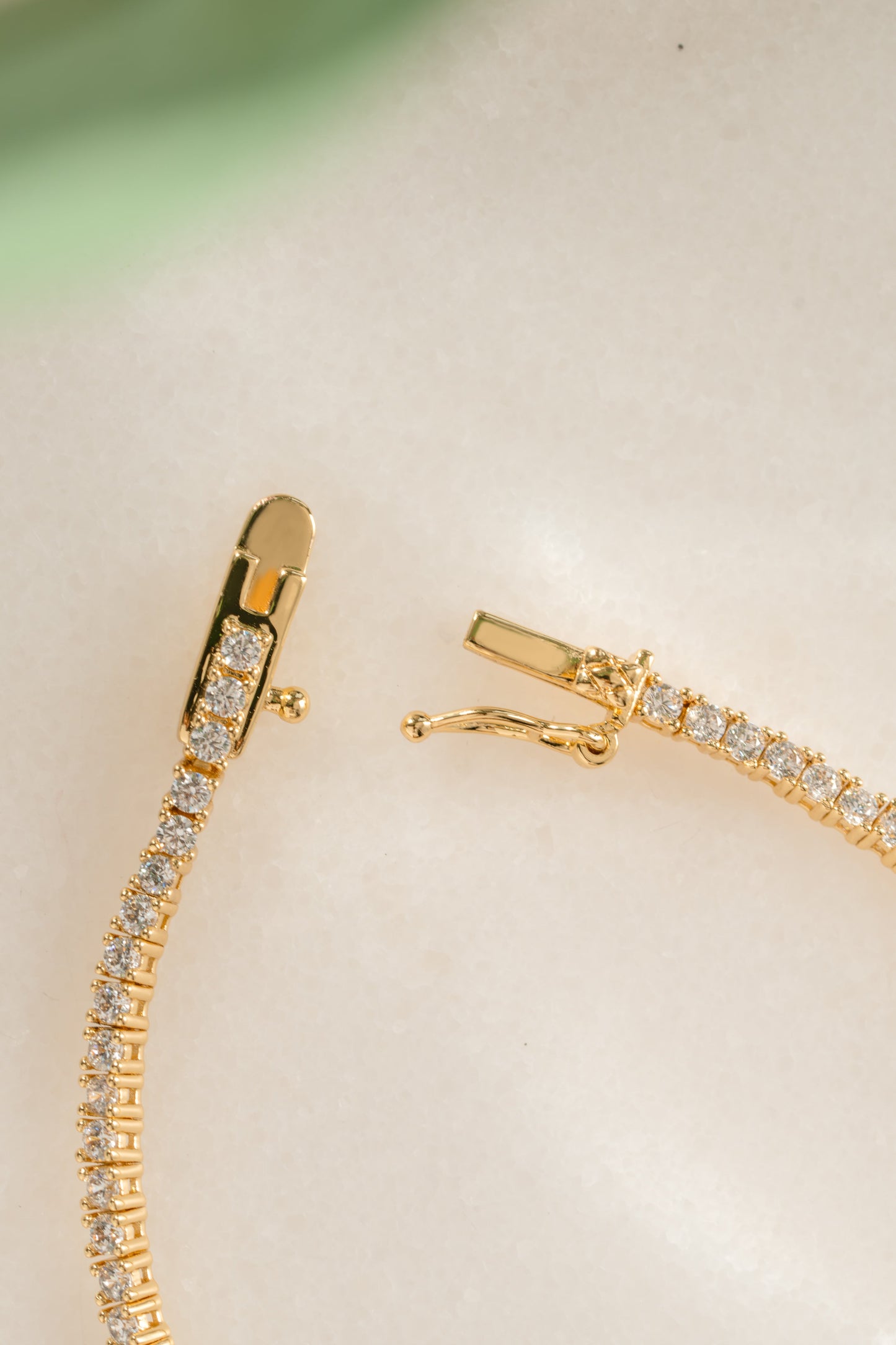 Bezeled Emerald-Cut Charm Tennis Bracelet