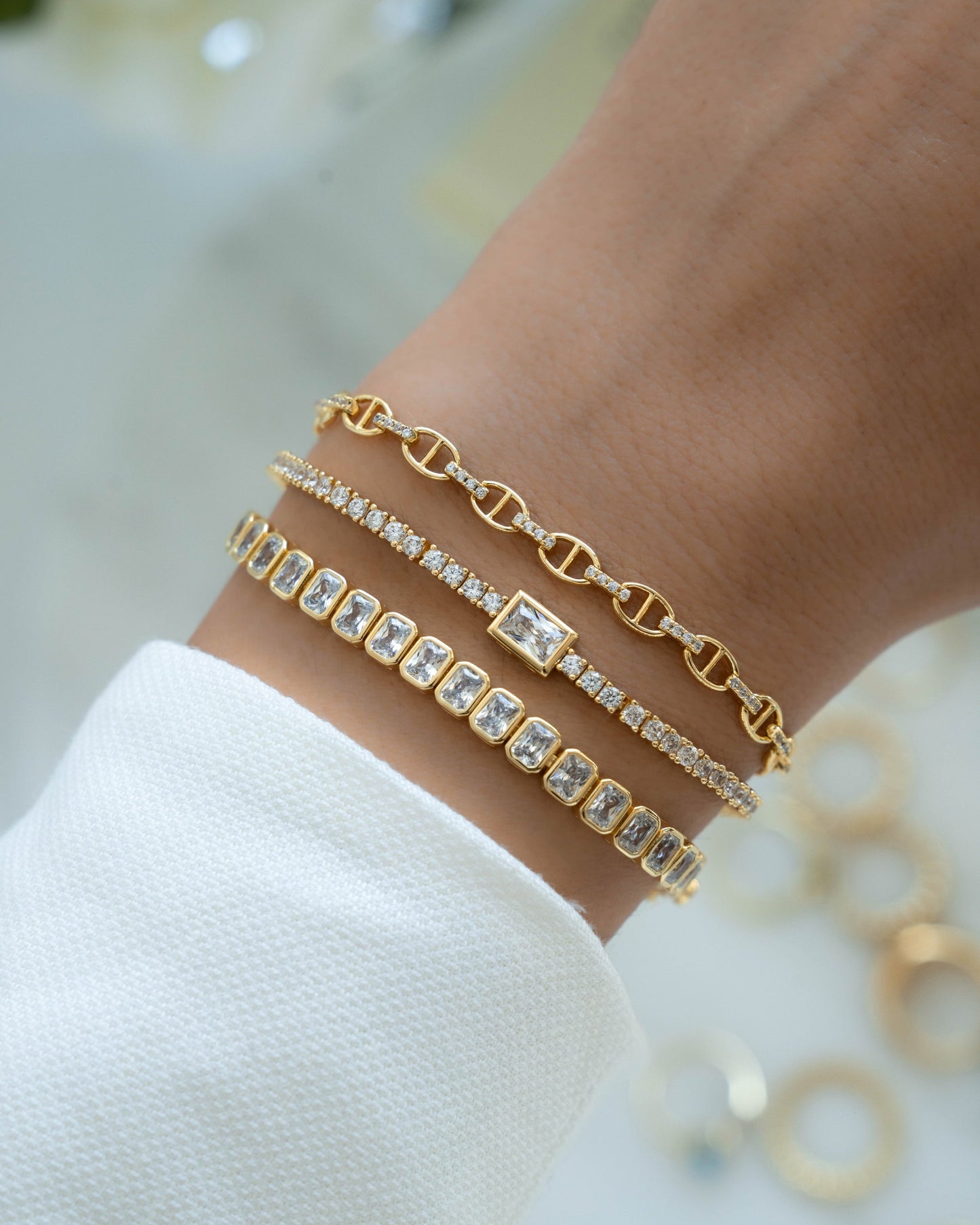 Bezeled Emerald-Cut Charm Tennis Bracelet