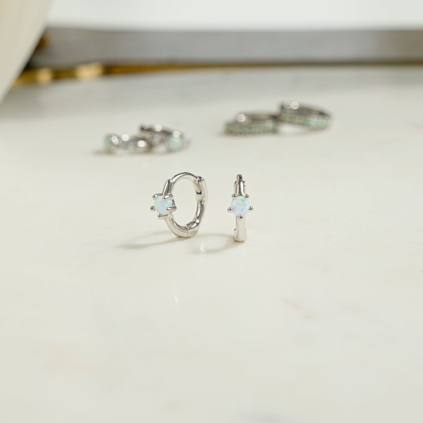 Solitaire Opal Huggies